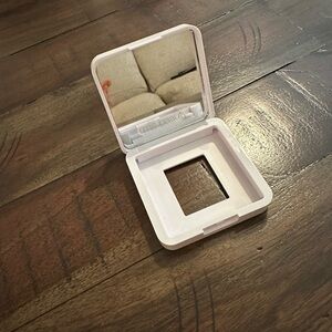 Empty compact for ReDimension Hydra powder blush refill.